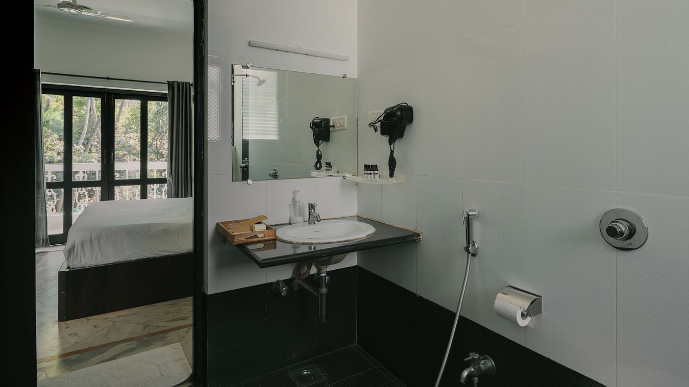 Elegant bathroom with modern fittings in the Three BHK Deluxe Villa at Richmonde Ananta Elite, Goa.