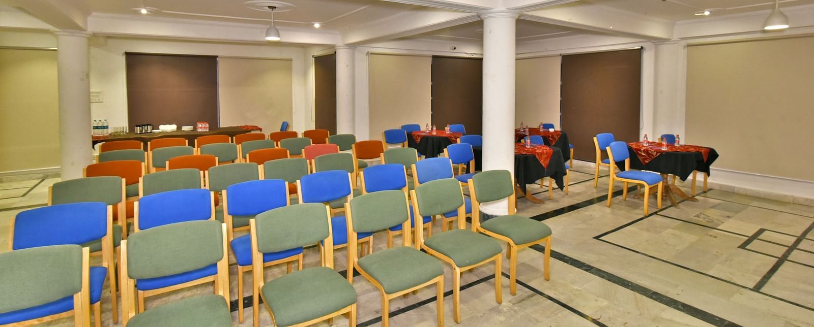Event space with multiple chairs arranged at DLS Hillcrest Resort, Shimla.