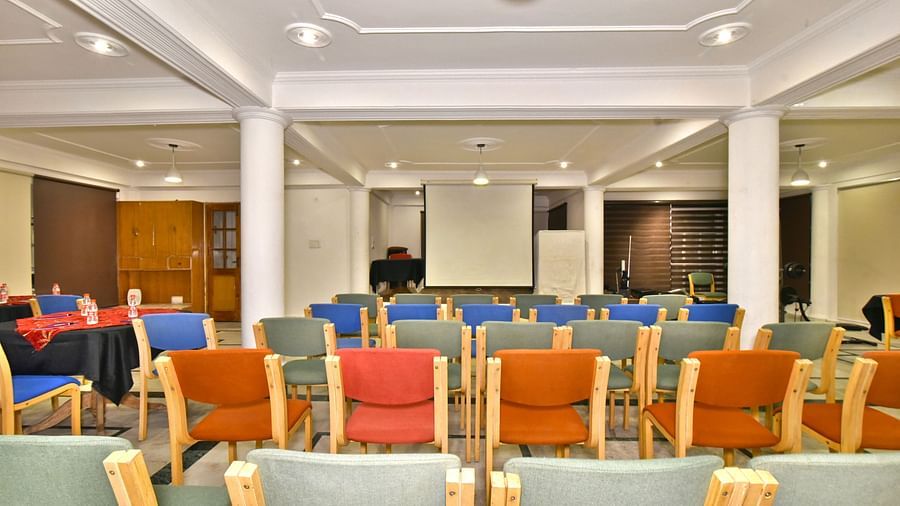 Back view of the event space with chairs arranged for a gathering at DLS Hillcrest Resort, Shimla.