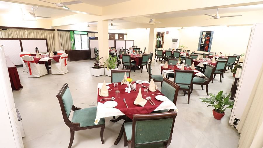 Light House Restaurant 3 vxk4a2 Light House Restaurant dining area set with tables, chairs, and cutlery, all prepared for a delightful meal.
