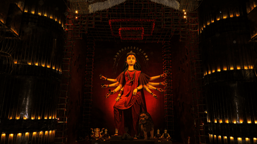 an idol of maa durga placed in a dark chamber
