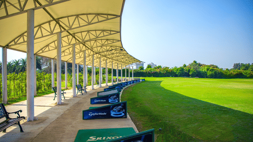 An overview of the driving range inside Karma Lakelands.