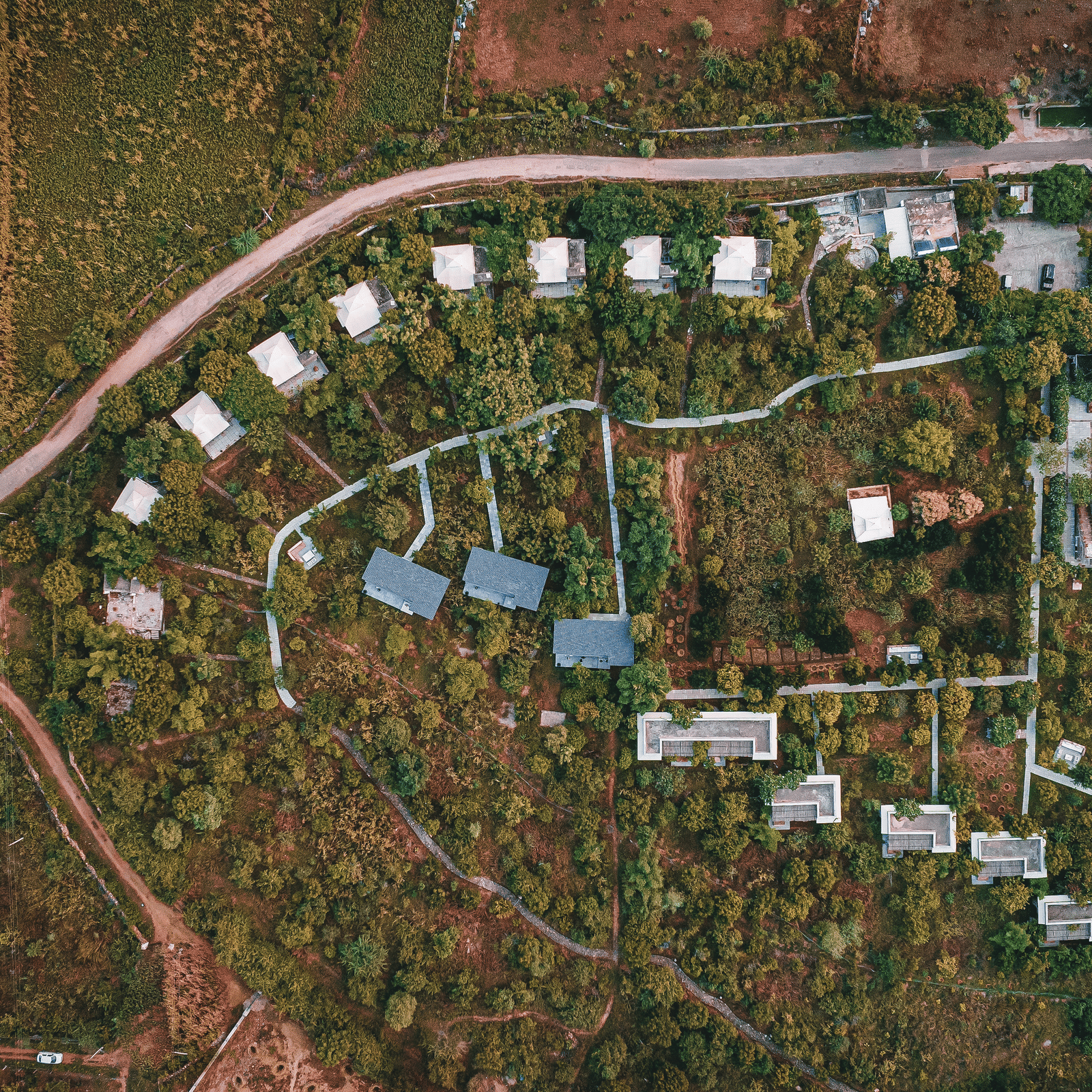 An aerial image of the Utsav Camp Sariska showcasing the hotel and greenery around it