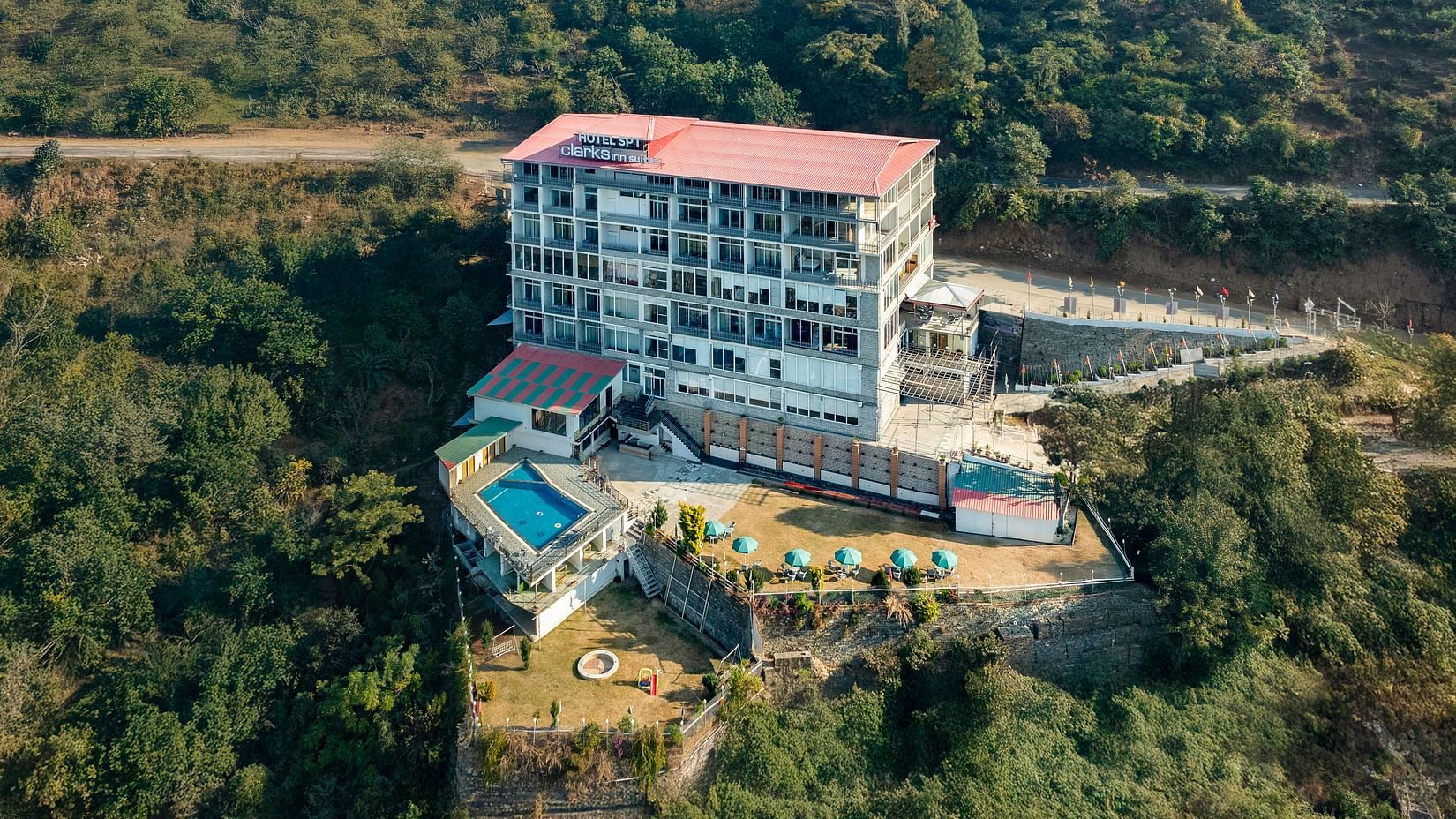 Facade image of the property - SPT Clarks Inn Suites, Mandi
