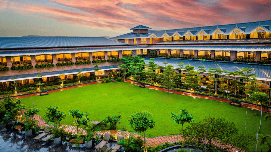 Panoramic exterior view of MAYFAIR Oasis Resort and Convention at dusk Jharsuguda