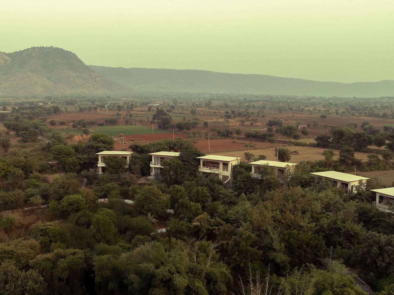 Overview of Utsav Camp Sariska surrounded by lush greenery