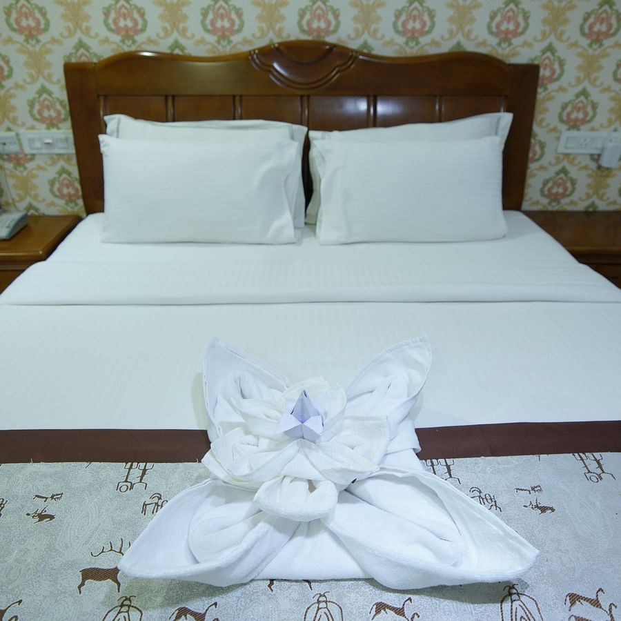 Close up view of the double bed in the Themed Villa of GK Hill View Resort.