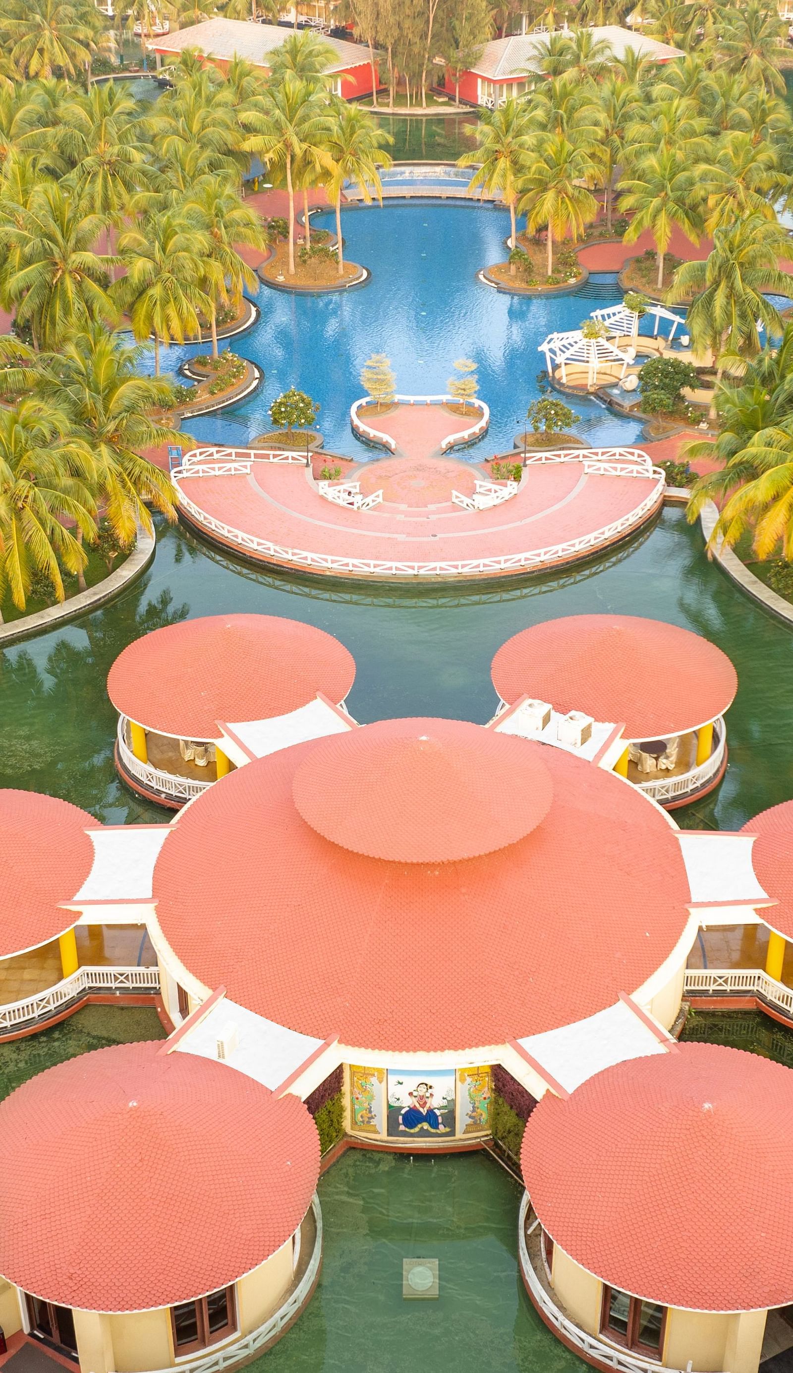 Lotosas Floating Restaurant with trees in the background - Ocean Spray Puducherry