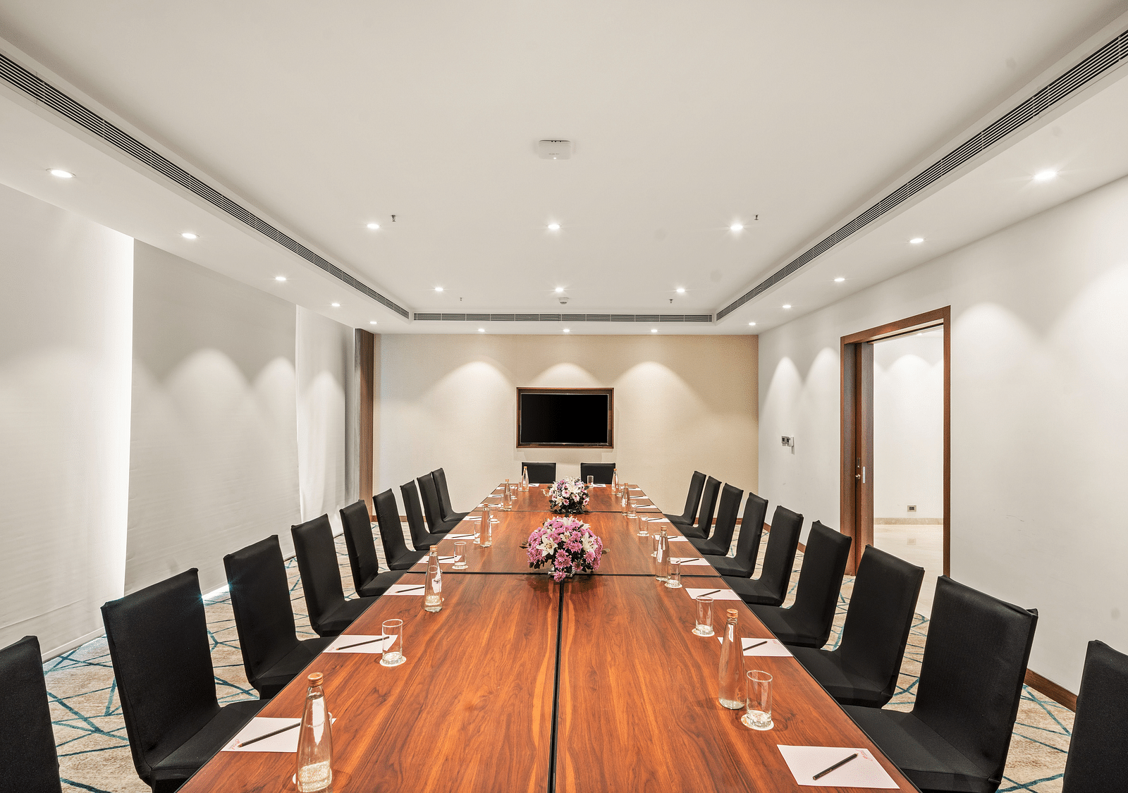 An image of a boardroom of Grand Club Lounge at Grand Vijayawada by GRT Hotels.