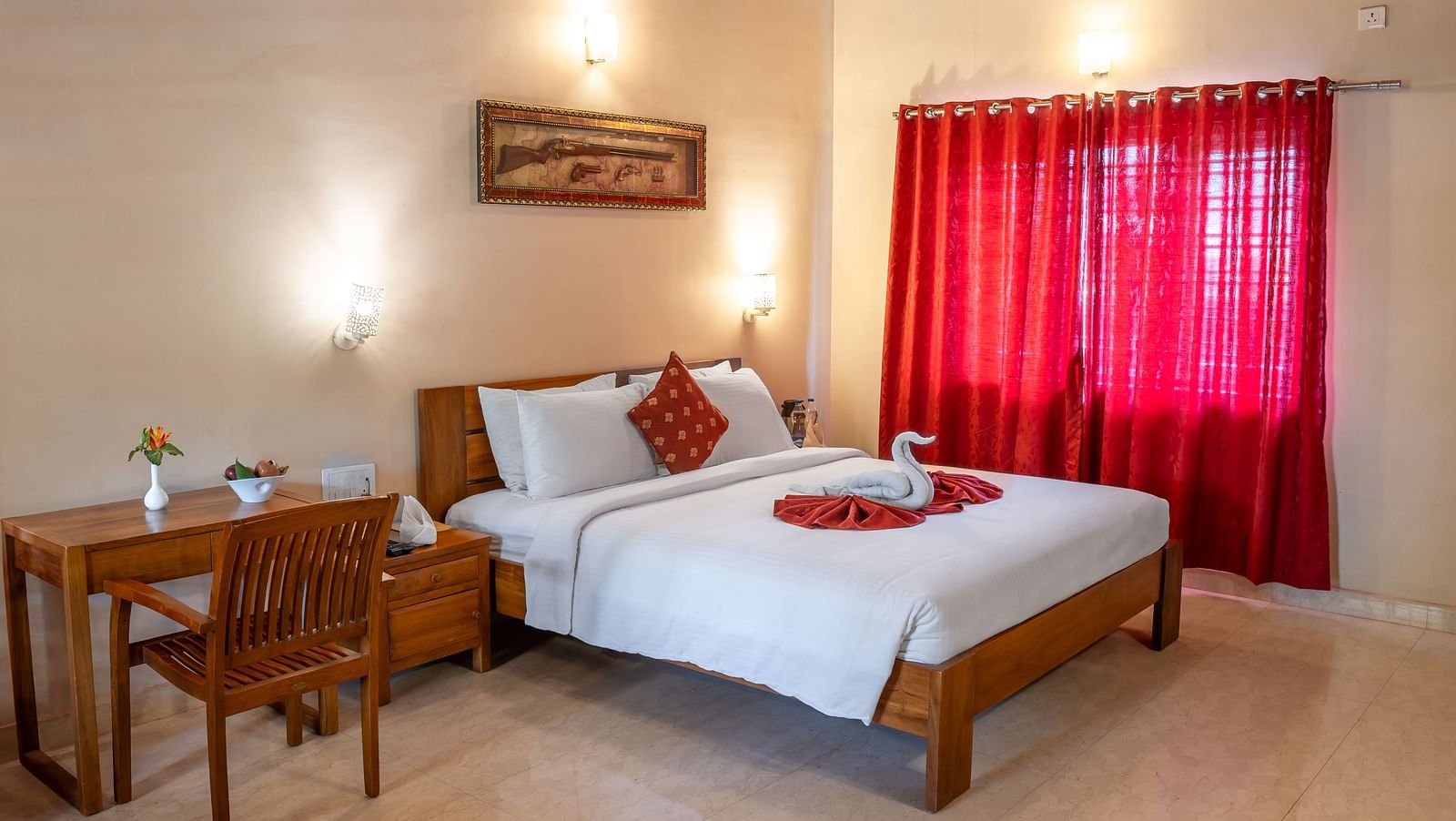 Attic Villa presented with a neatly made bed, red curtains, and minimal decor | Woodstock Resorts, Coorg