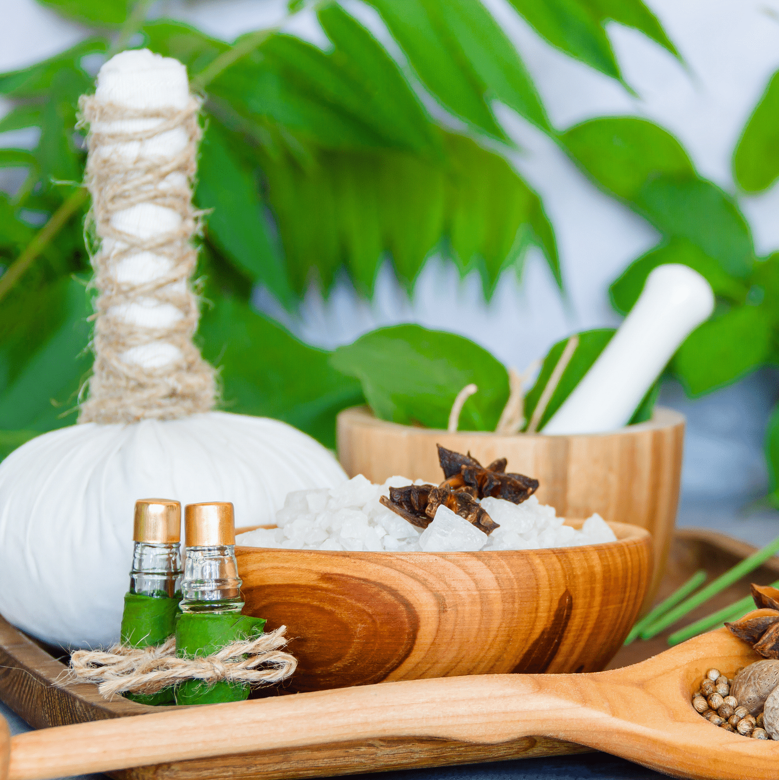 an image of spa materials and honey placed together - Rhythm Kumarakom