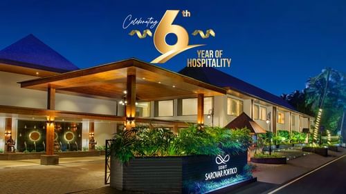 Sobit Sarovar Portico, Goa is celebrating its 6th Anniversary with the illuminated resort building prominently featured in the low-light photograph.