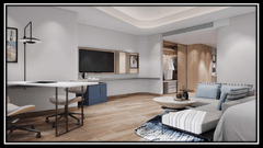 The hotel room with a desk, television, and seating area at Riviera Sarovar Portico, Pathankot.