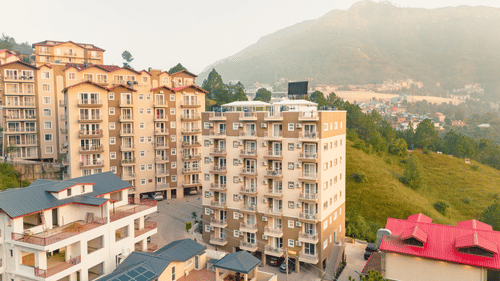 Facade view of Montclair Ananta, Elite during the day.