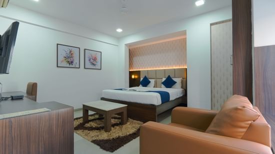 A picture featuring interior view of the  room with sofa and TV - Magnus Aerith Studio, Kharadi