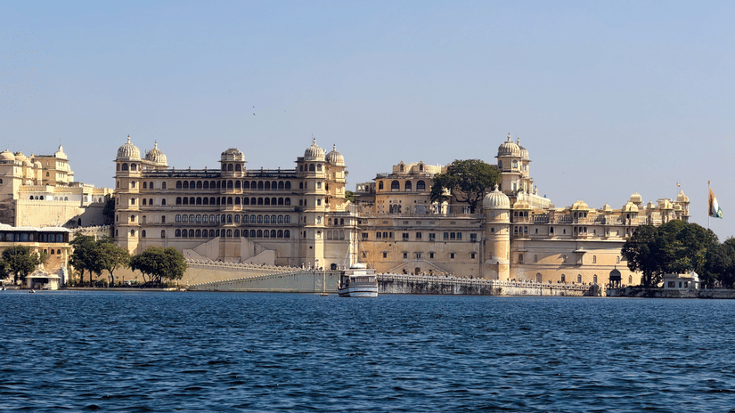 A wide view of City palace, Udaipur, on the blue water of lake pichola.