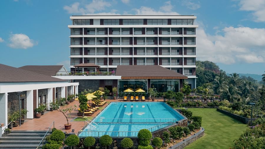 facade view of Cloud9 Sarovar Premiere, Palolem Goa with a swimming pool.