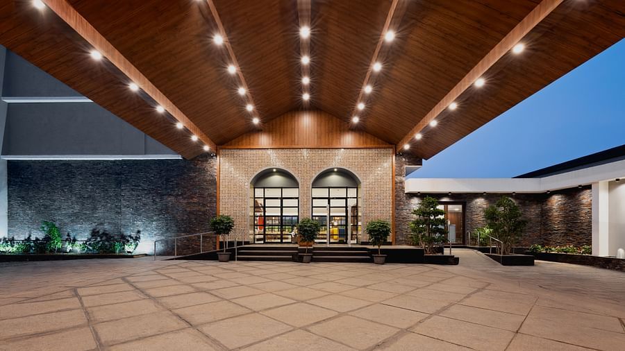 an image of exterior view of the Cloud9 Sarovar Premiere, Palolem Goa illuminating white lights.