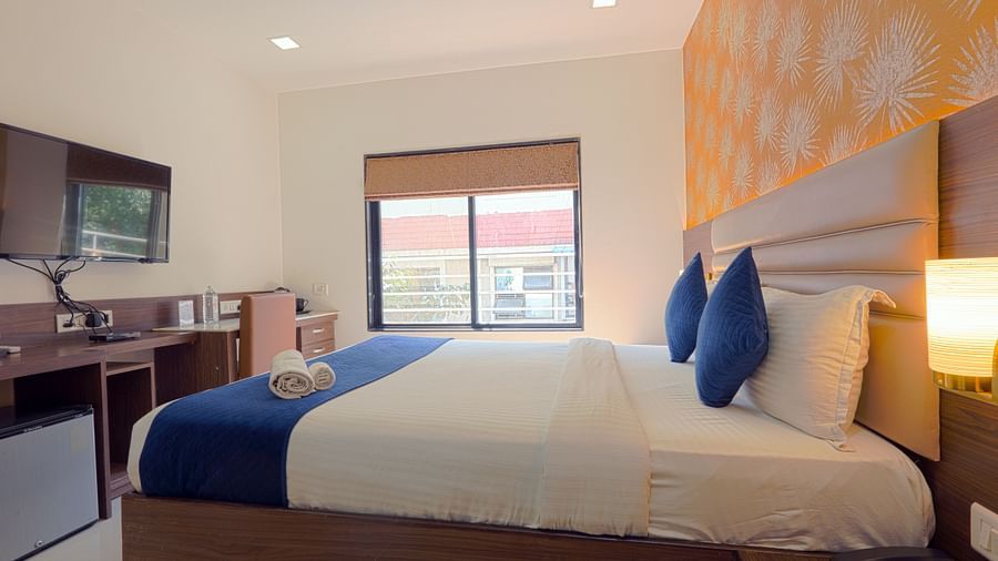 A picture featuring interior view of the  room with sofa and TV - Magnus Aerith Studio, Kharadi