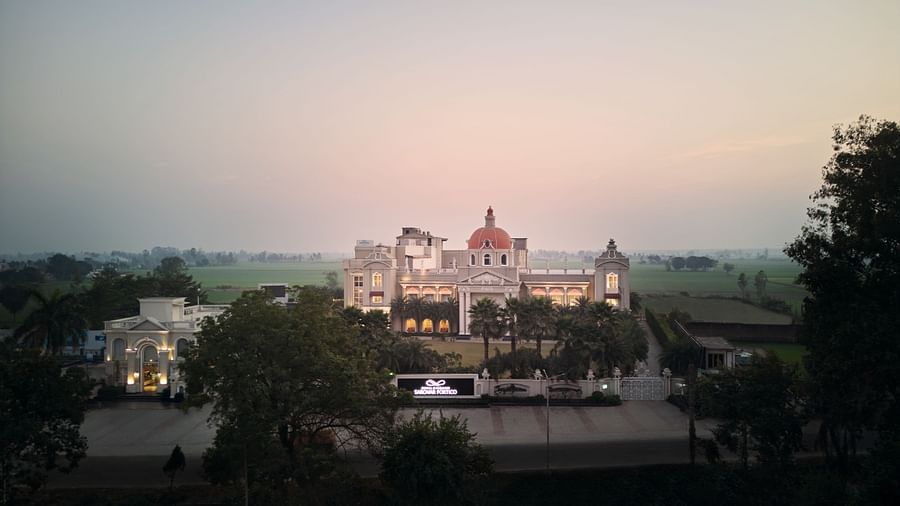 aerial view of the facade at dusk - Royal Kingdom Sarovar Portico, Pilibhit