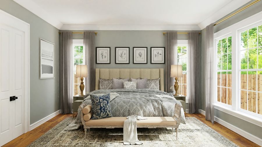 A spacious, tastefully designed bedroom with a double bed and a window with views