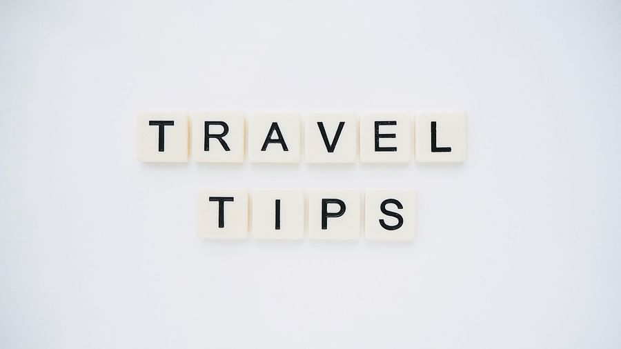 Travel Tips made out of scrabble tiles and placed on a table