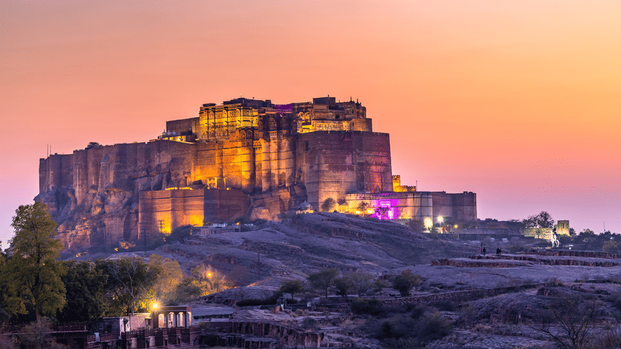 Sunset view of Mehrangarh Fort in Jodhpur reflecting Rajasthan’s royal heritage and historic architecture