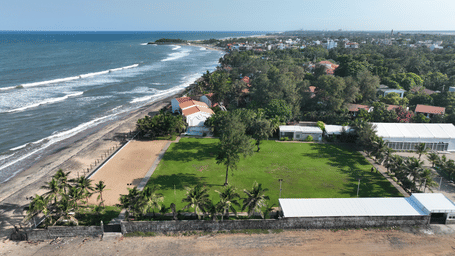 Aerial view of  a beach resort in Mahablipuram on ECR, with the beach visible on one side - Grande Bay Resort & Spa, Mamallapuram