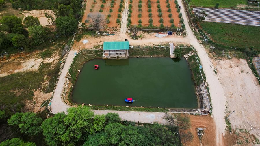 Top view of a Water body with a small house next to it