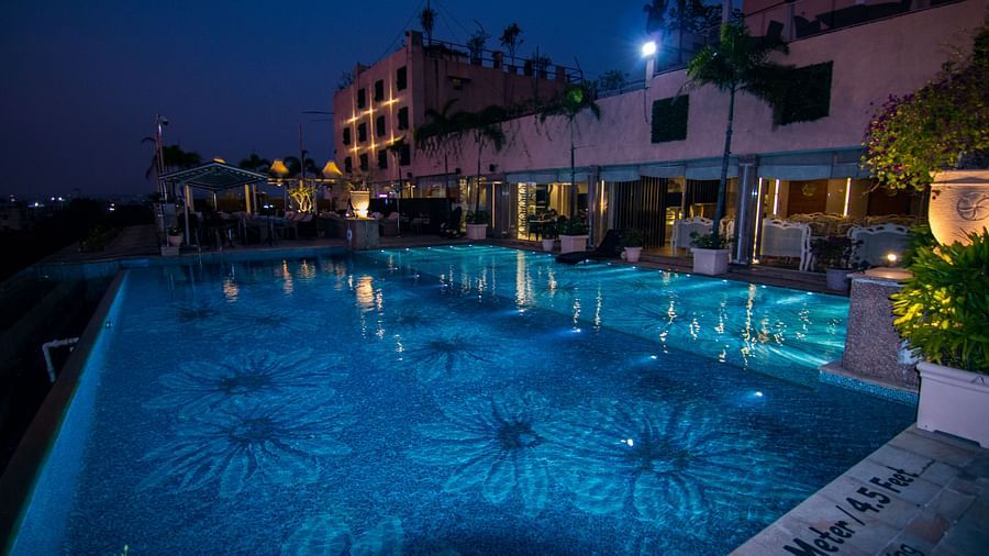 View of the swimming pool at Hotel Ashok Nagpur.