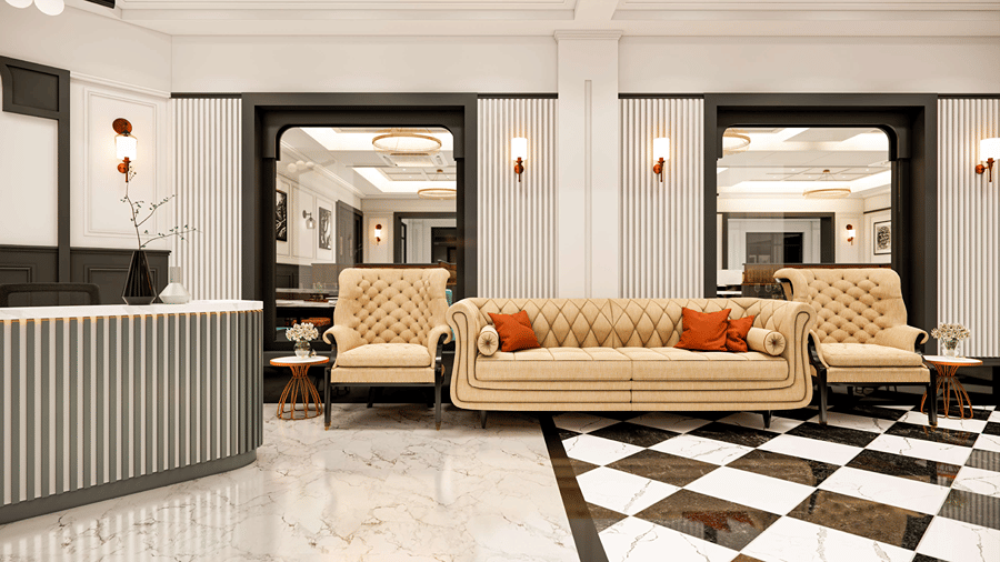 Elegant hotel lobby with a check-in reception desk, checkered black-and-white tile flooring, and plush beige sofas.