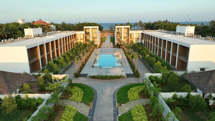 A top angle shot of the exterior of The Shore Trishvam, Pondicherry with a common swimming pool in the middle.