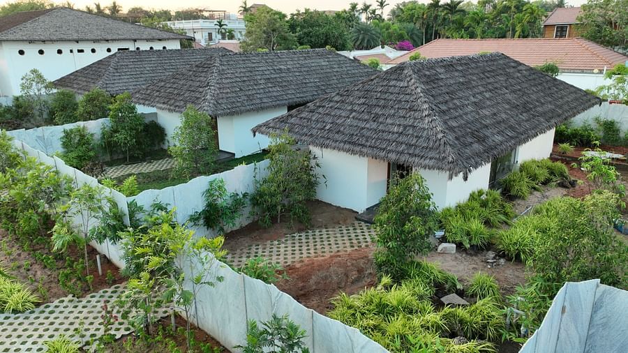 Bird eye view of the individual villas of the Pool View Bliss surrounded by a lot of plants at The Shore, Trishvam