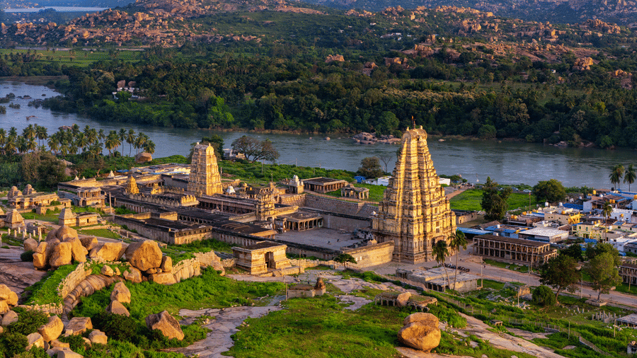 Aerial view of Virupaksha Temple and Tungabhadra River near Evolve Back Hampi