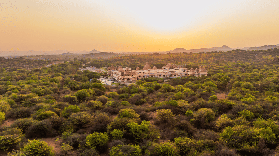 Golden sunset aerial view over the rocky Hampi landscape near Evolve Back resort
