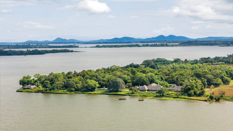 Wide view of the Kabini reservoir with forested islands near Evolve Back Kabini