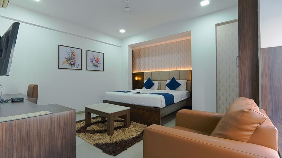 alt-text A picture featuring interior view of the  room with sofa and TV - Magnus Aerith Studio, Kharadi