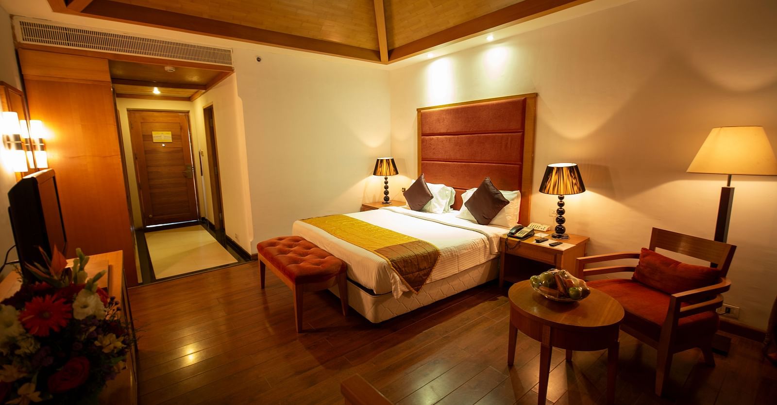 a double bed inside HEAVENS Category Room at Ocean Spray Puducherry