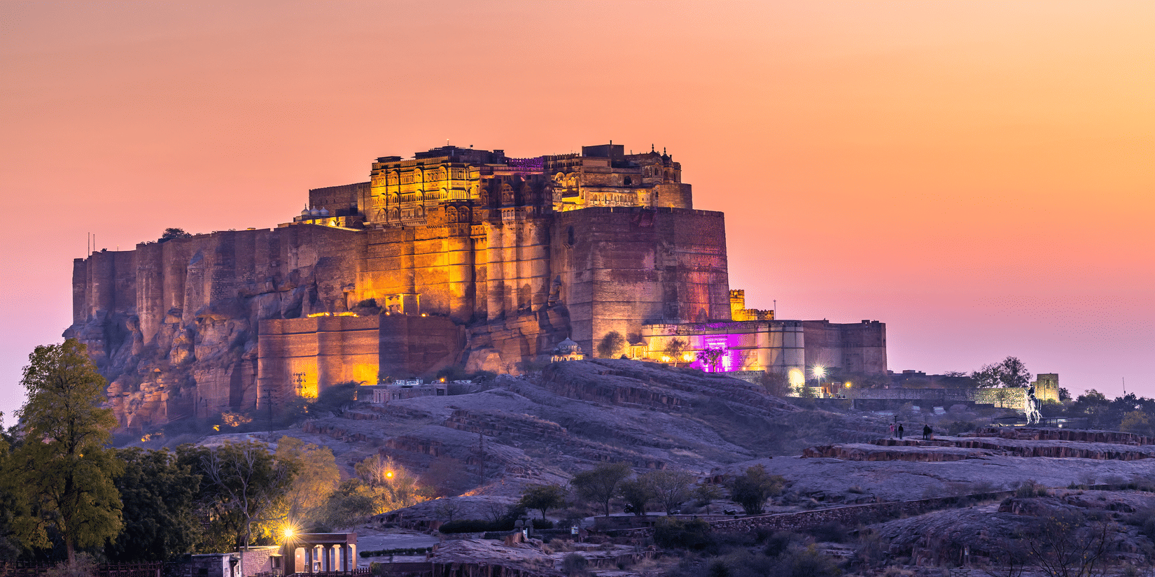 Sunset view of Mehrangarh Fort in Jodhpur reflecting Rajasthan’s royal heritage and historic architecture