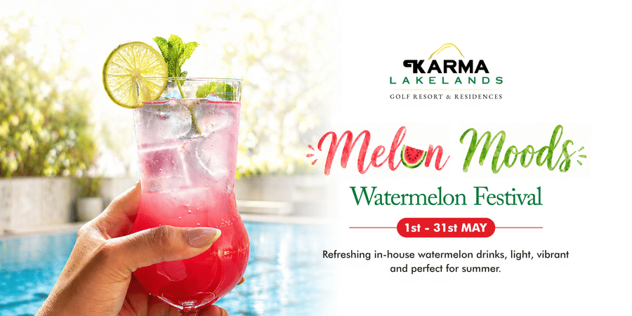 A promotional poster for Karma Lakelands showcasing a refreshing melon-based drink held near a poolside, with text announcing 'Melon Moods Weekend Fiesta', along with event details.