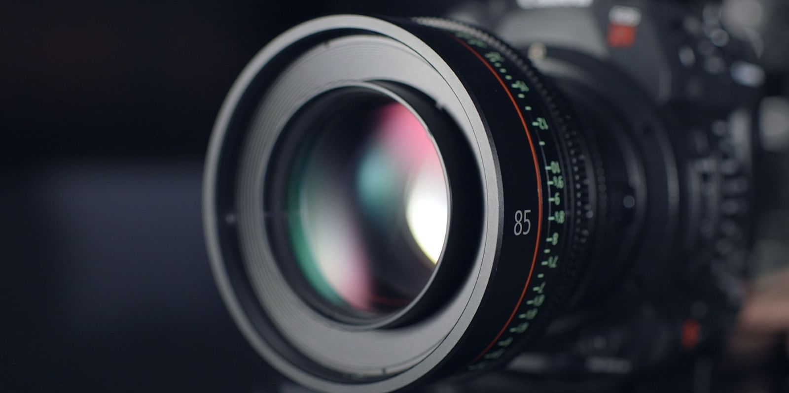 DSLR camera lens in sharp focus on its own.
