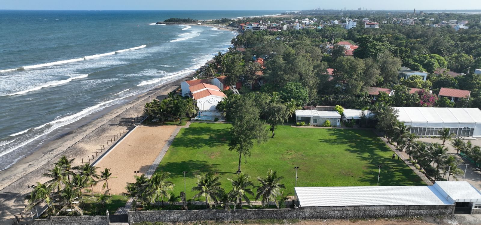 Aerial view of Grande Bay Reosort & Spa featuring the greenery and the shore.