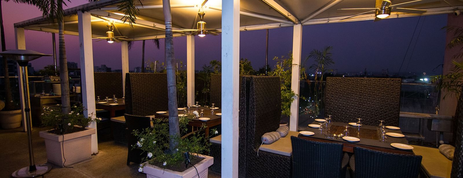 An outdoor dining setup at Hotel Ashok Nagpur.