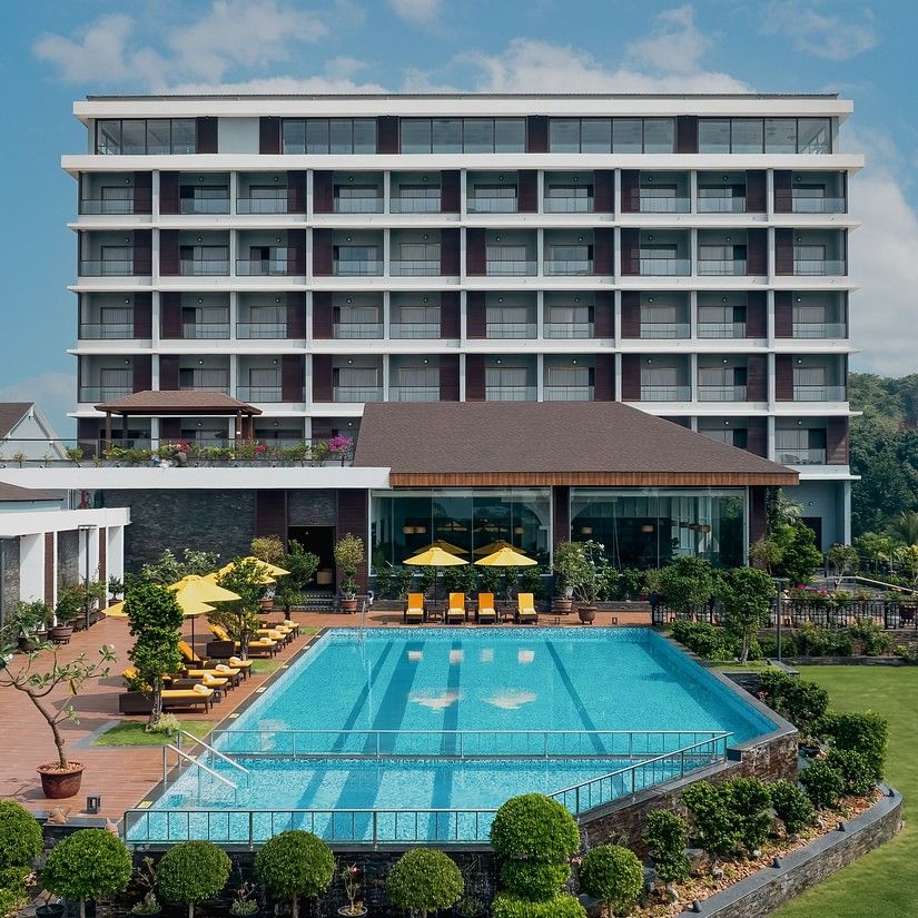 facade view of Cloud9 Sarovar Premiere, Palolem Goa with a swimming pool.