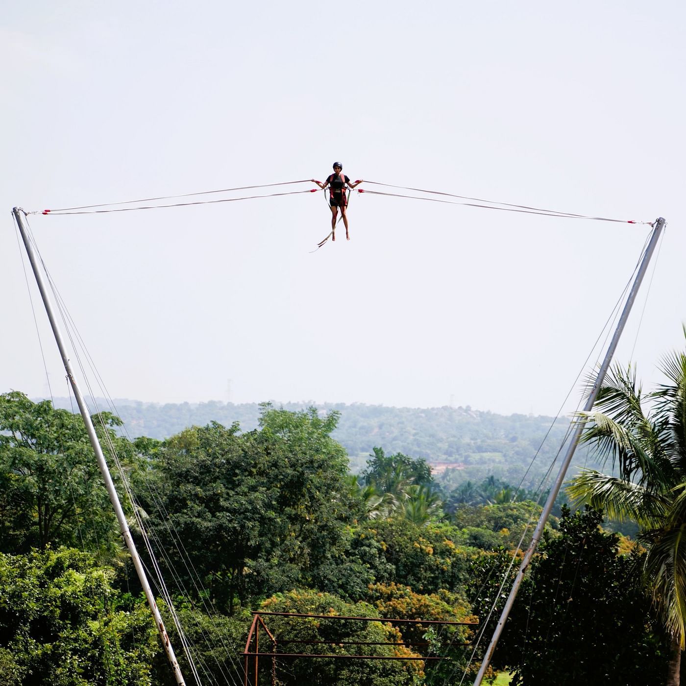 Image of a person enjoying high in the air on Rocket Line Ejector at Ravishing Retreat