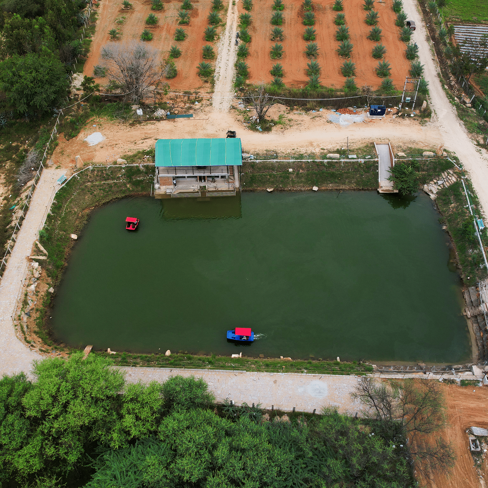 Top view of a Water body with a small house next to it