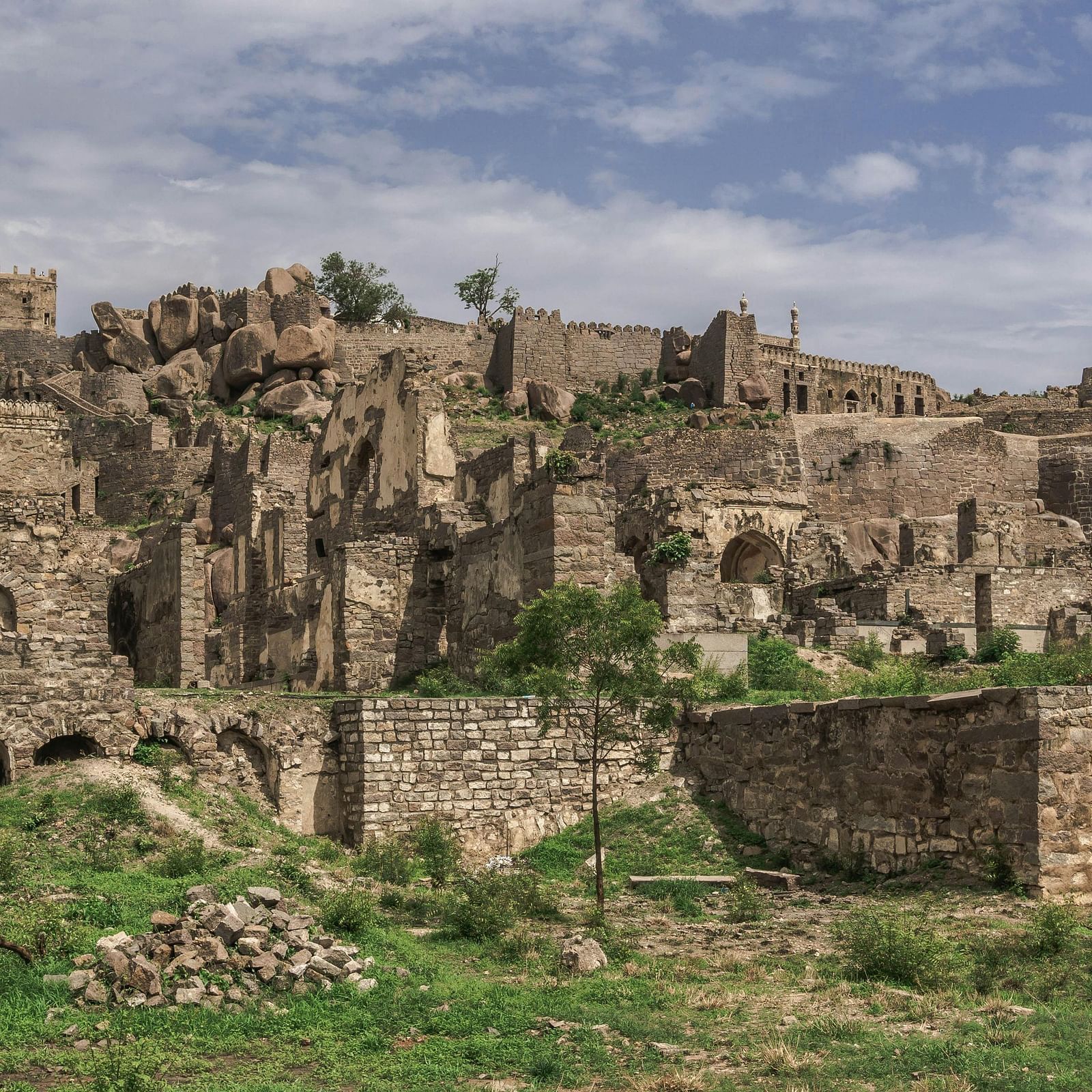 Old fort stands against a cloudy sky