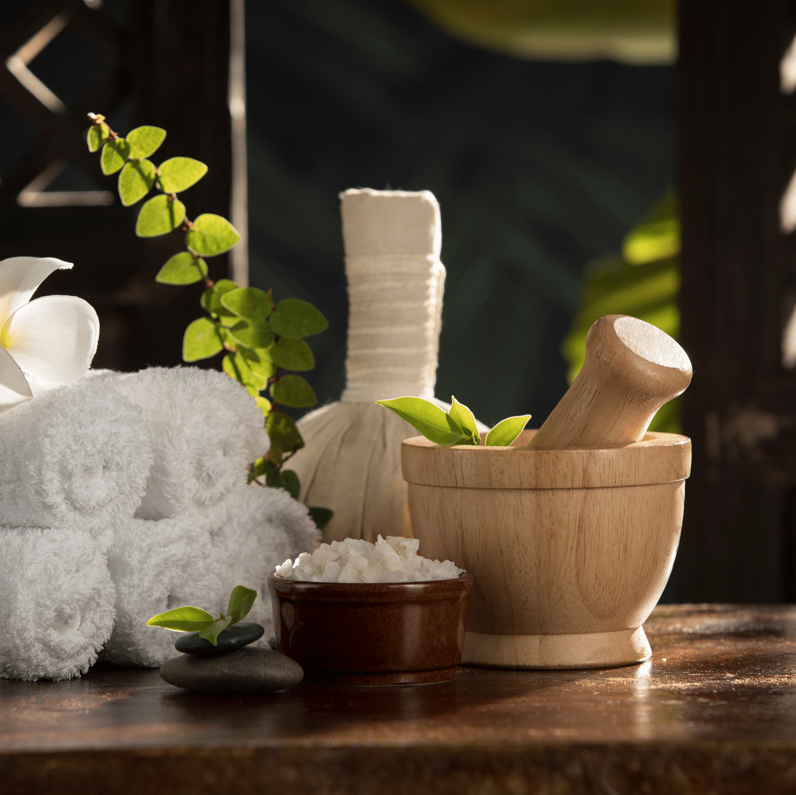 spa items including towels, salts and more in view - Rhythm Kumarakom