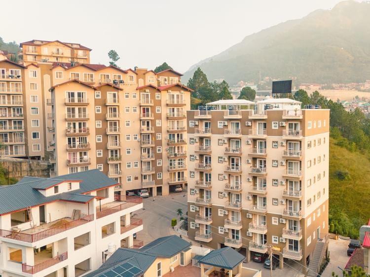 Facade view of Montclair Ananta, Elite during the day.