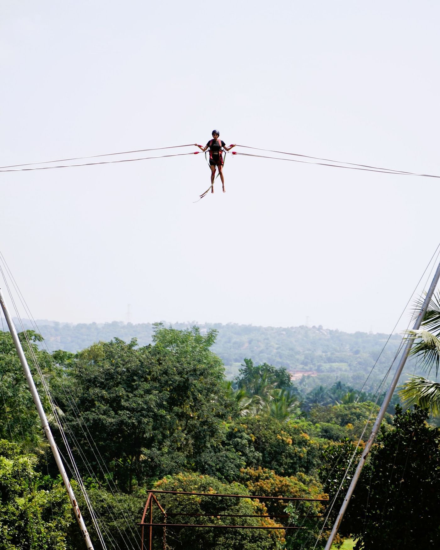 Image of a person enjoying high in the air on Rocket Line Ejector at Ravishing Retreat